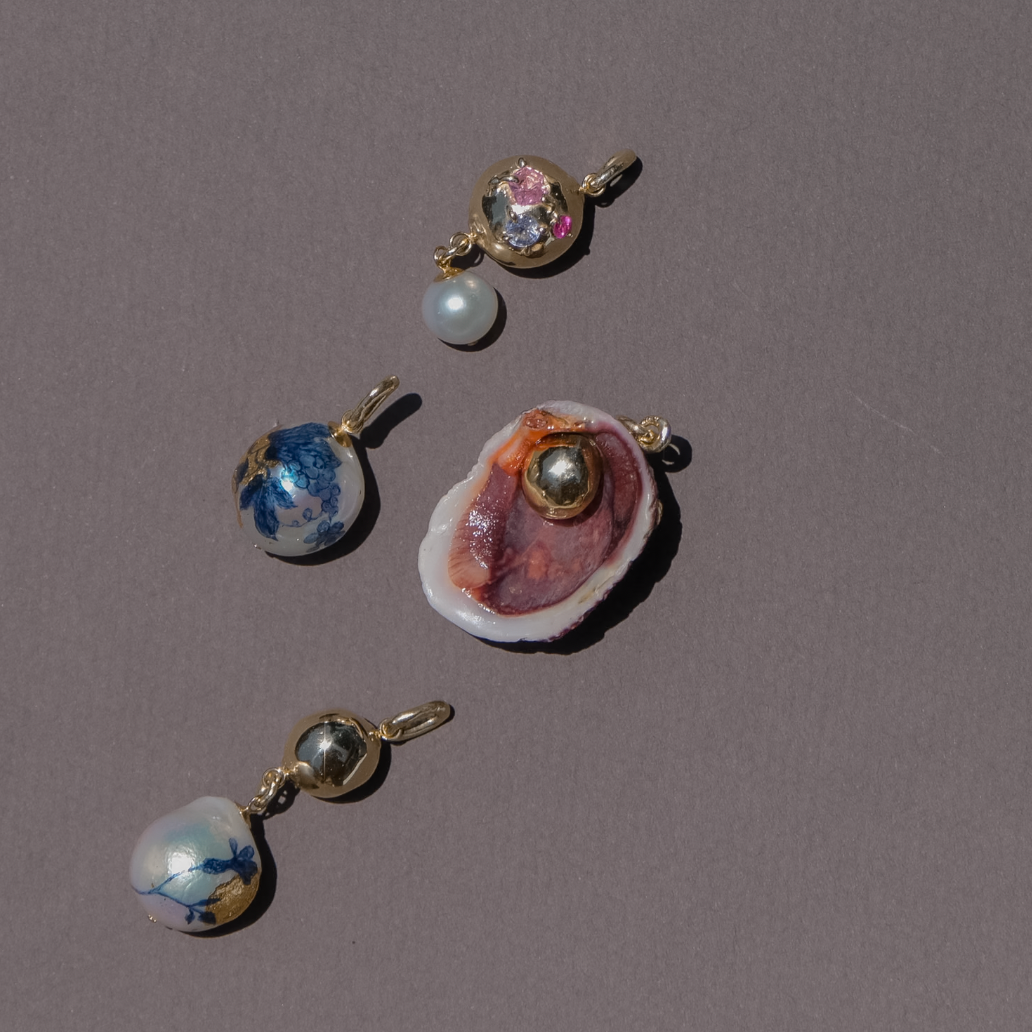 Orb In Shell On Lucet Silk Cord